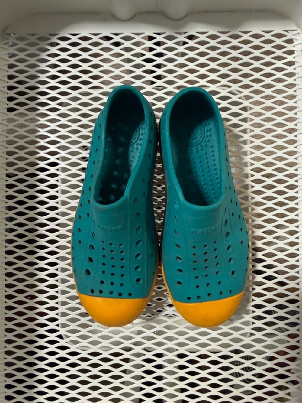 Native shoes, teal and orange